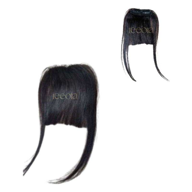 A clip-in bangs piece, shown on the studio white