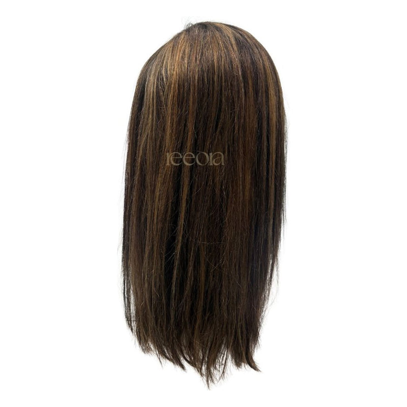 A straight piece in honey caramel, shown from behind